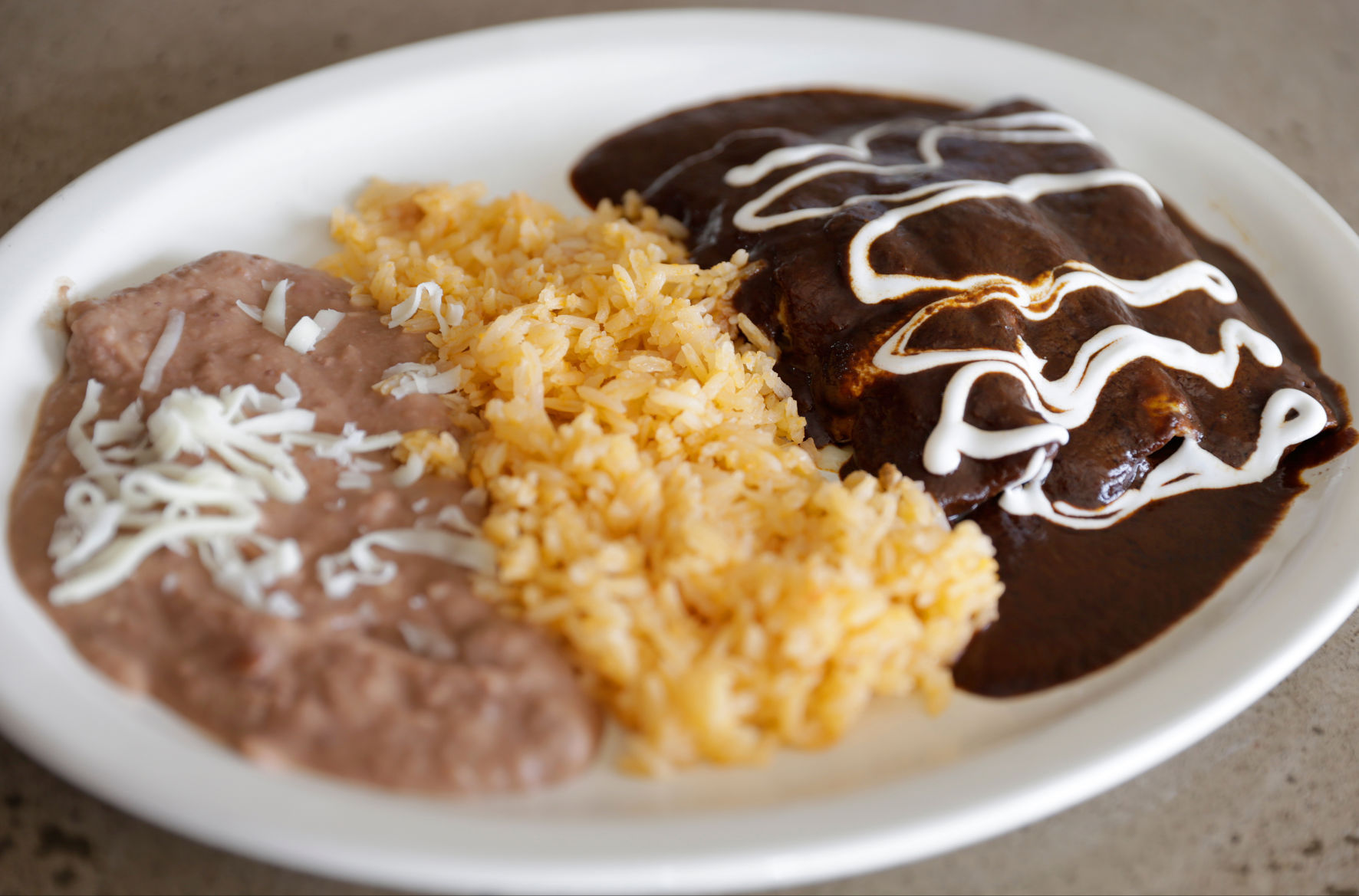 Los Atlantes enchiladas mole